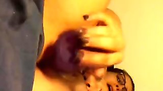 Young slut pleasures herself with thick dildo